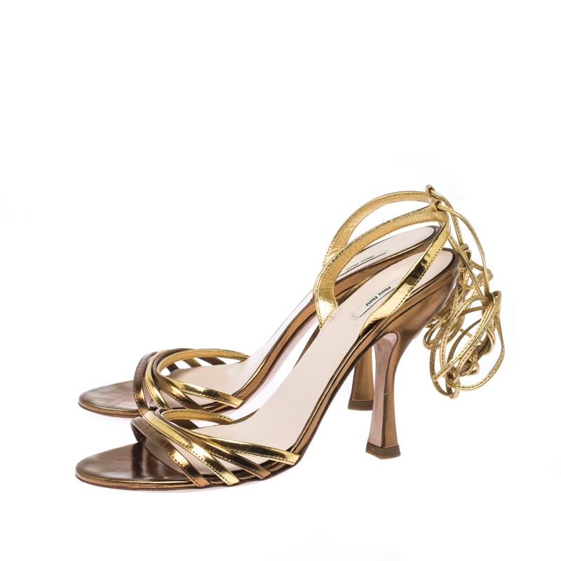 gold heels that wrap around leg