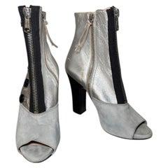 Miu Miu Metallic Silver & Grey Suede Peep-Toe Button Booties, Resort 2010 EU 38 Miu Miu Metallic Silver & Grey Suede Peep-Toe Button Booties, Resort 2010 EU 38