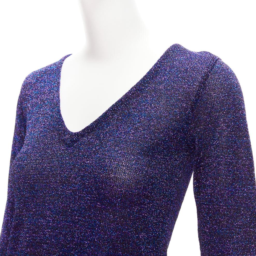 MIU MIU midnight blue purple glitter lurex V-neck sweater IT40 S
Reference: CELG/A00341
Brand: Miu Miu
Designer: Miuccia Prada
Material: Polyester, Blend
Color: Purple, Blue
Pattern: Solid
Closure: Elasticated
Made in: Italy

CONDITION:
Condition: