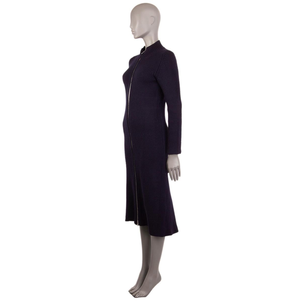 100% authentic Miu Miu long knit coat in dark blue rib wool (100%) with zip. Has been worn and is in excellent condition.

Measurements
Tag Size	42
Size	M
Shoulder Width	39cm (15.2in)
Bust	82cm (32in) to 92cm (35.9in)
Waist	72cm (28.1in) to 82cm