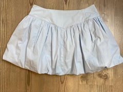 Miu Miu miniskirt effect shorts.