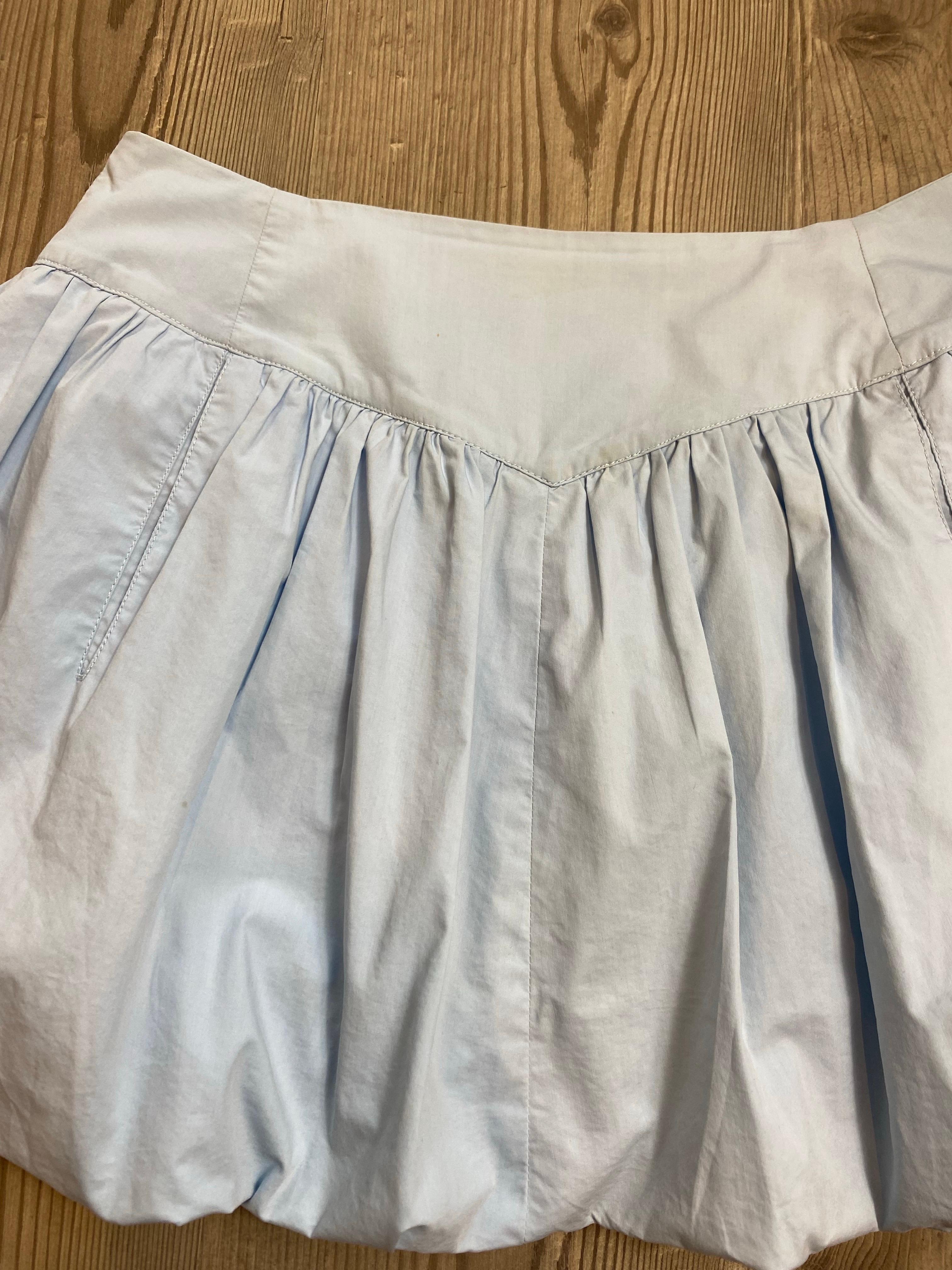 Gray Miu Miu miniskirt effect shorts. For Sale