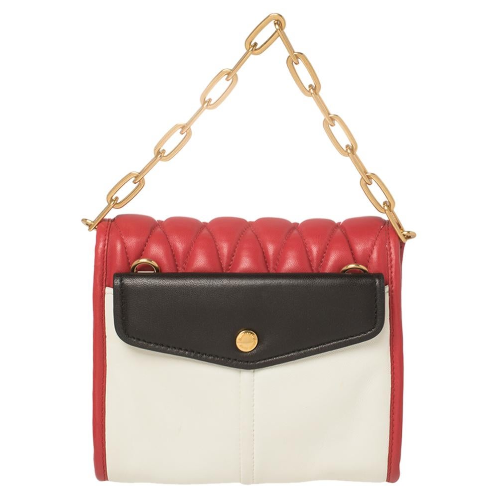 A structured and compact crossbody bag can assist you with many outings and can be styled with most of your attires. This Miu Miu bag is an example of the label’s penchant for creating staple pieces. It is crafted from leather in diamond-shaped