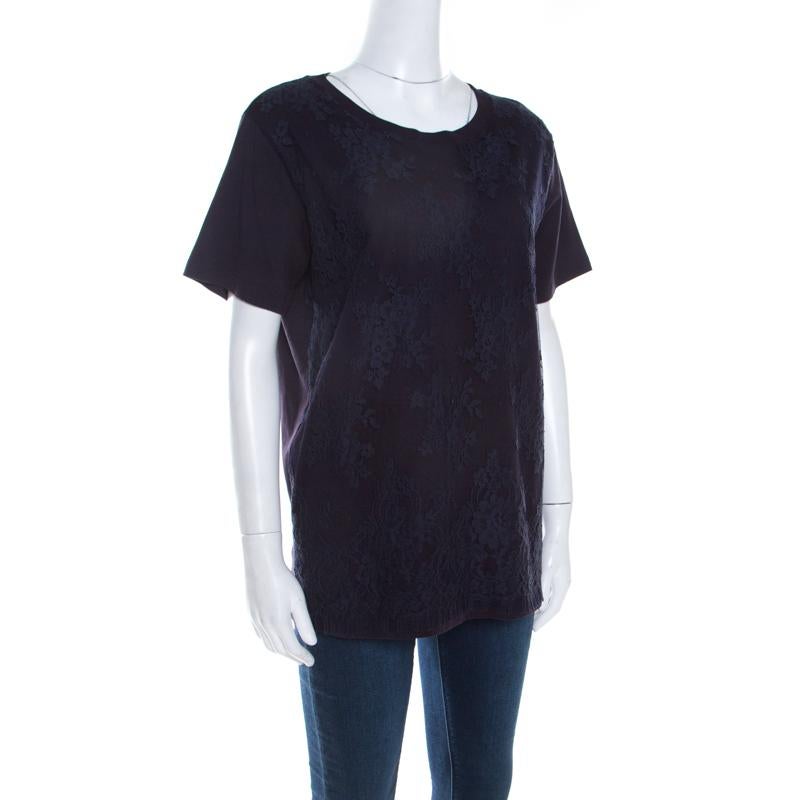 Pick this fabulous navy blue t-shirt and re-define your style. Enhanced with lace overlay, this wonderful piece is made from luxurious blended fabrics. This Miu-Miu creation features short sleeves and a back tie-up detail.

Includes: The Luxury