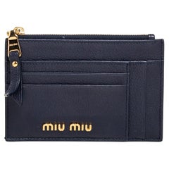 Miu - Porte-cartes à fermeture éclair en cuir bleu marine