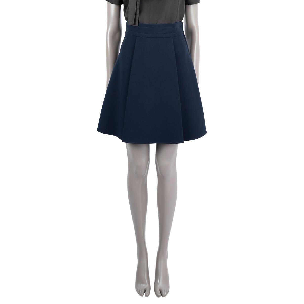 100% authentic Miu Miu flared short skirt in midnight blue triacetate (71%) and polyester (29%). The design features side pockets and two front pleats. Opens with a zipper on the side. Brand new with tags. 

Measurements
Tag Size	38
Size	XS
Waist