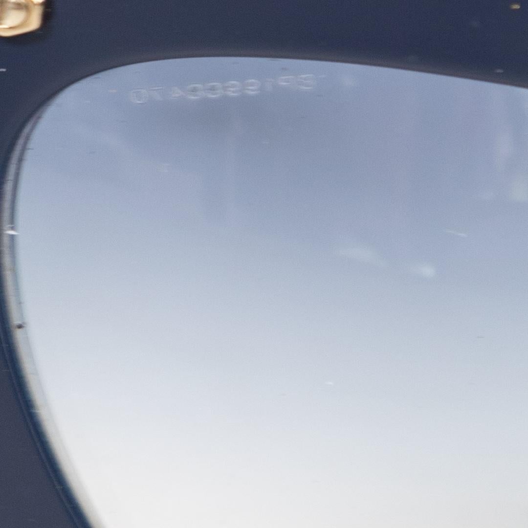 Gafas de sol Miu Miu mariposa azul marino en venta 1