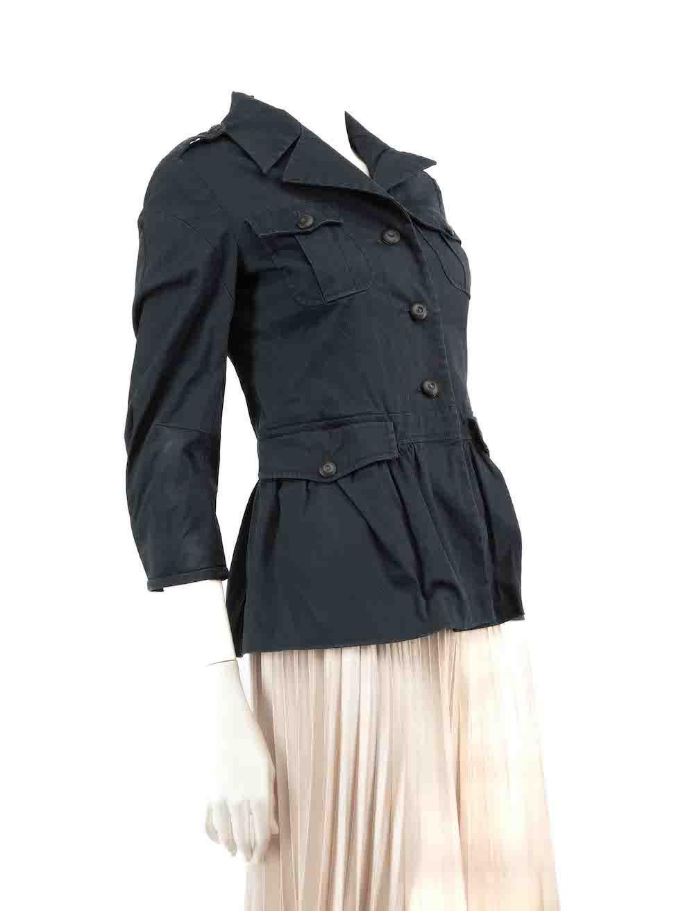 CONDITION is Very good. Minimal wear to jacket is evident. Minimal wear to the right side where there are marks near the cuffs on this used Miu Miu designer resale item.
 
 
 
 Details
 
 
 Navy
 
 Cotton
 
 Utility jacket
 
 Button up fastening
 
