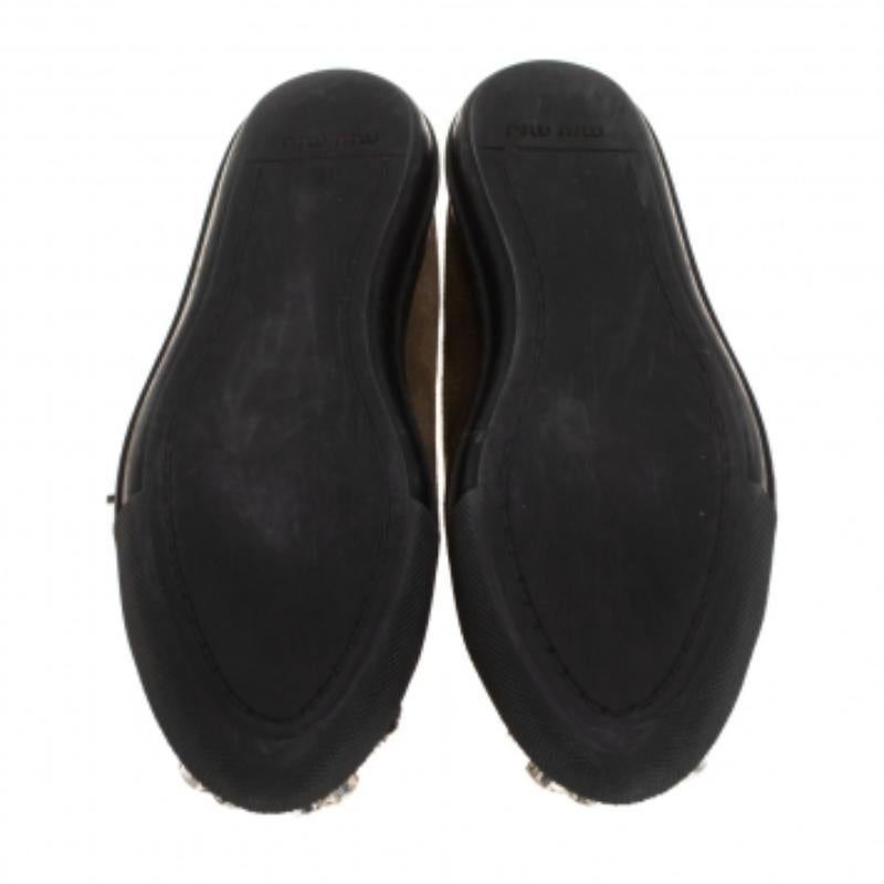 A signature Miu Miu style, these low-top sneakers for women are crafted in suede, lined with shearing on the insoles, and detailed with crystals on the cap toes. They are secured with lace-ups and set on durable rubber soles.