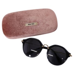 Lunettes de soleil ovales Miu Miu