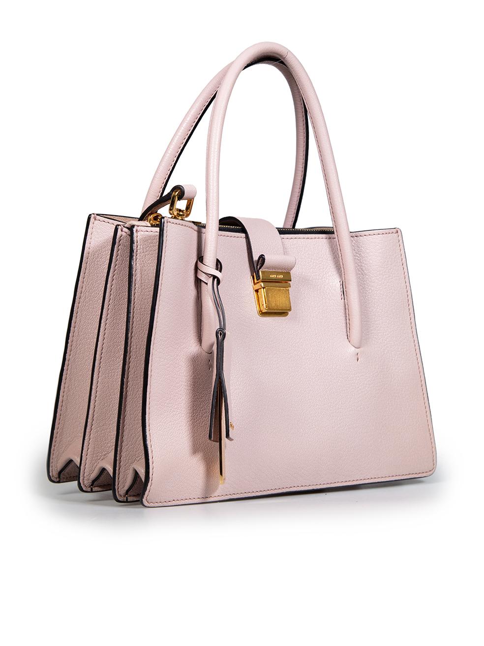 CONDITION is Very good. Minimal wear to bag is evident. Minimal wear to the right edge stitching with small abrasions and discolouration and the internal suede with discolouration on this used Miu Miu designer resale item. Comes with dust bag.
 
 
