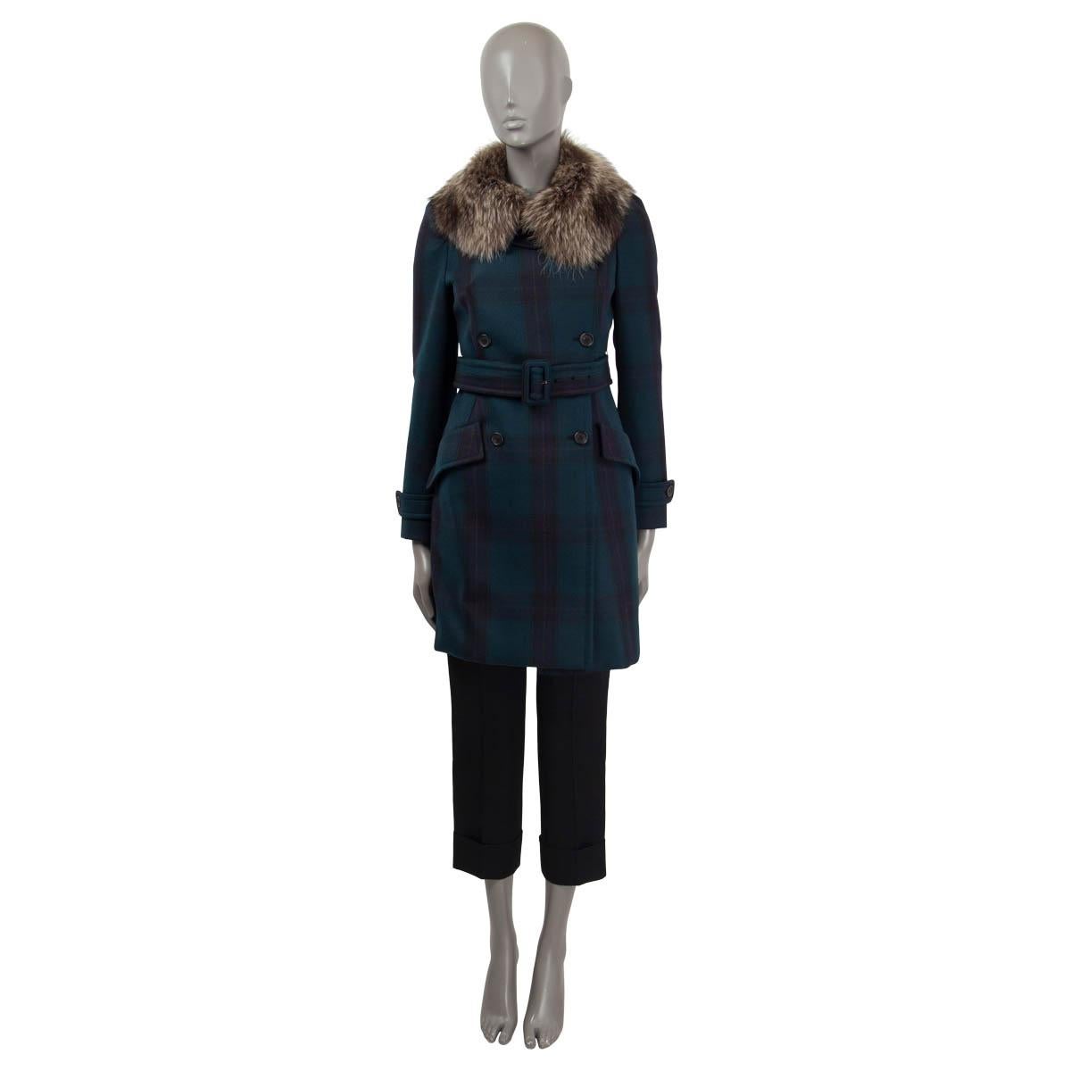 100% authentic Miu Miu double breasted coat in petrol, purple and black wool (100%). Features a detachable raccoon fur (100%) collar and a matching detachable belt. Has two flap pockets, a slit on the back and epaulettes on the cuffs. Opens with