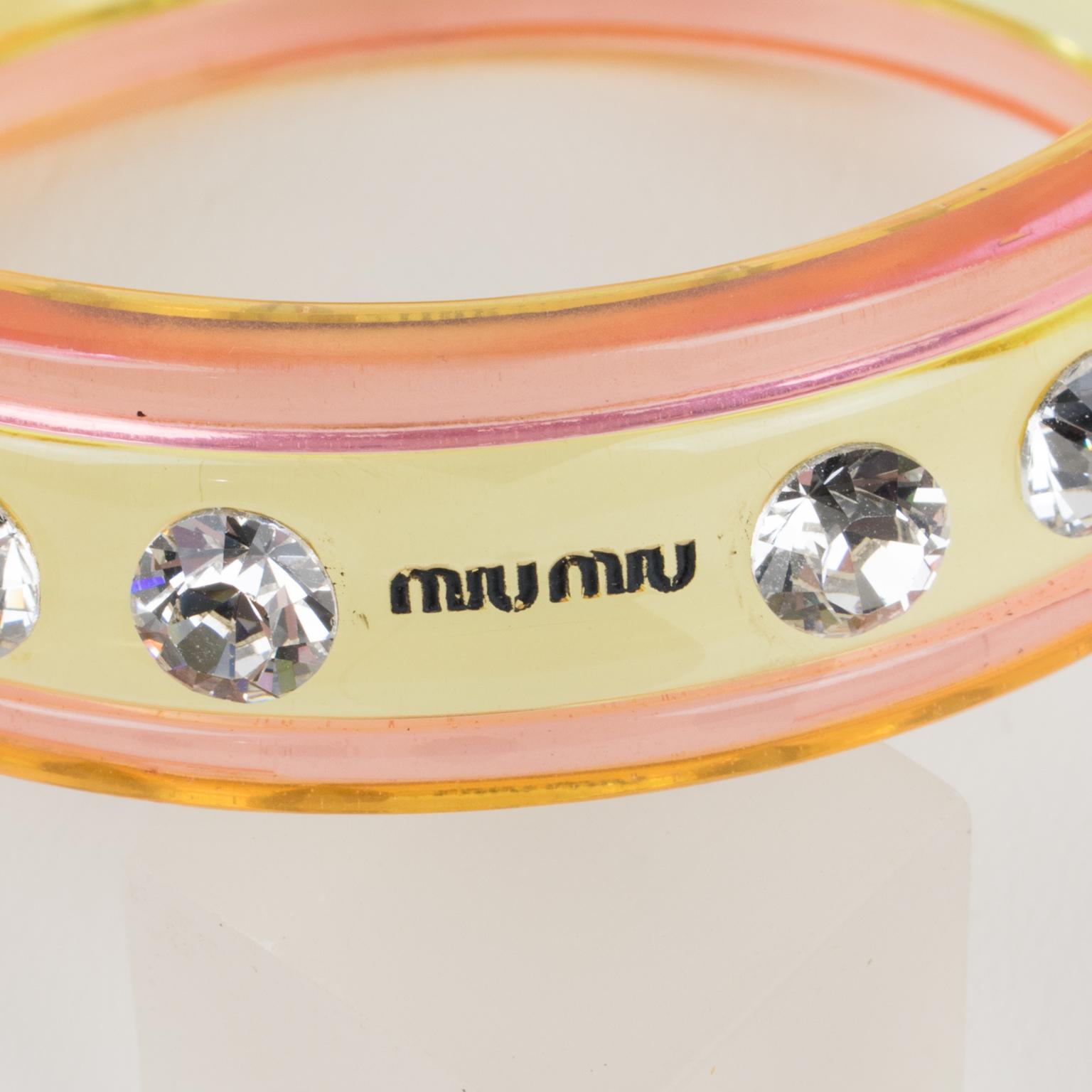 Miu Miu Pink and yellow Acrylic Bracelet Bangle with Bow Charm In Excellent Condition In Atlanta, GA