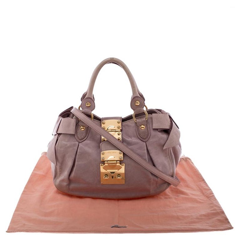 Miu Miu Pink Distressed Leather Bow Satchel at 1stDibs