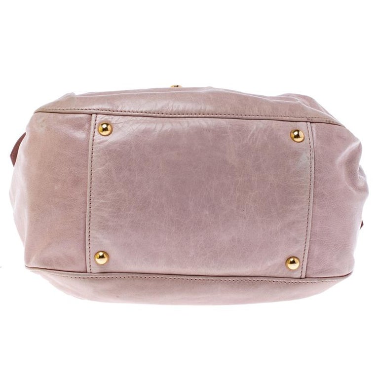 Miu Miu Pink Distressed Leather Bow Satchel at 1stDibs