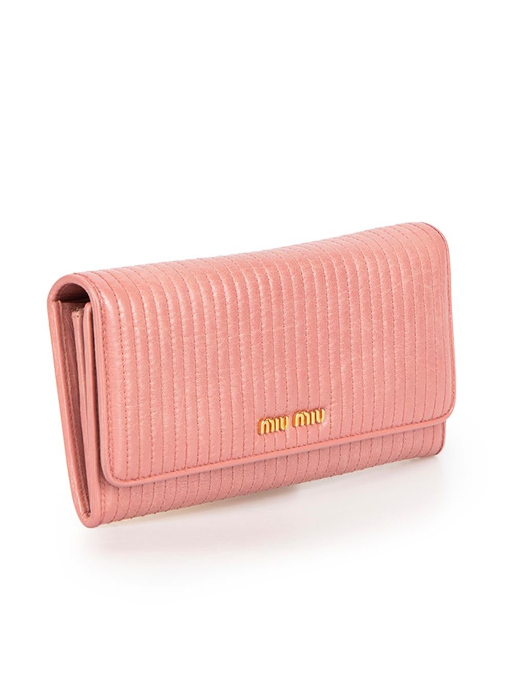 CONDITION is Very good. Minimal wear to wallet is evident. Minimal wear to the exterior with darkening and general creasing to the leather on this used Miu Miu designer resale item. This wallet comes with original box.
 
 Details
 Pink
 Leather
