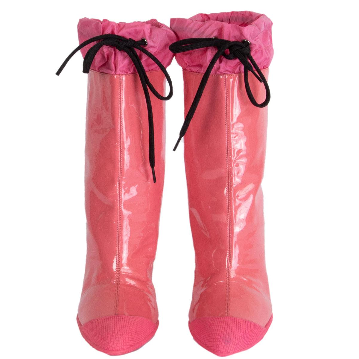 100% authentic Miu Miu rain-boots in bubble gum patent leather with rubber sole and waterproof top detail with drawstring laces. Cap toe. Brand new. 

Imprinted Size	36
Shoe Size	36
Inside Sole	23cm (9in)
Width	7cm (2.7in)
Heel	9cm