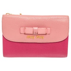 Miu Miu Pink Red Compact Wallet with gold-tone hardware, trim leather, exterior