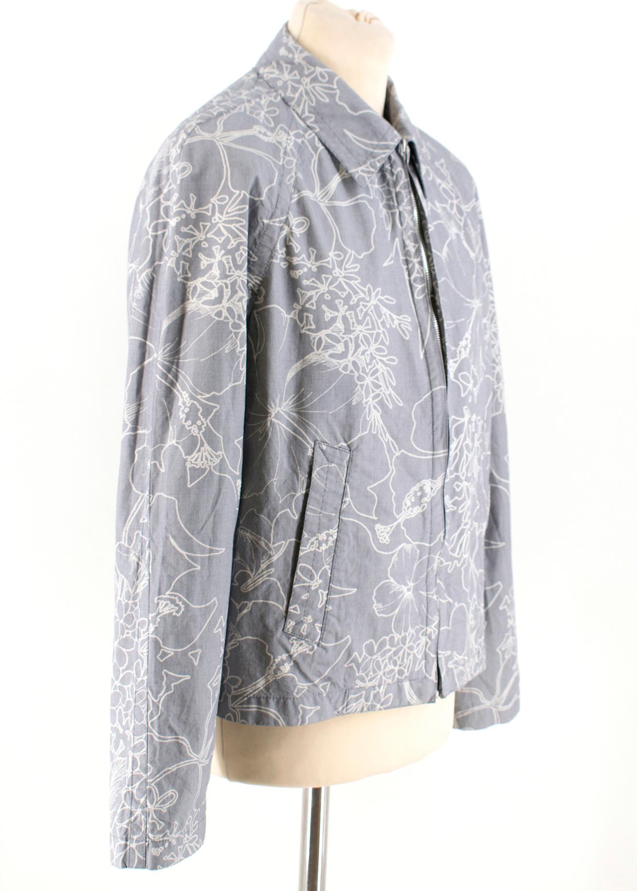 MIU MIU Patterned Cotton Zip-Up Jacket

- Front Zip Closure 
- Pointed Collar 
- Two Side Slip Pockets
- Lightweight 
- Patterned Design Throughout 

100% Cotton 

Made in Italy

Dry Clean Only 

Please note, these items are pre-owned and may show
