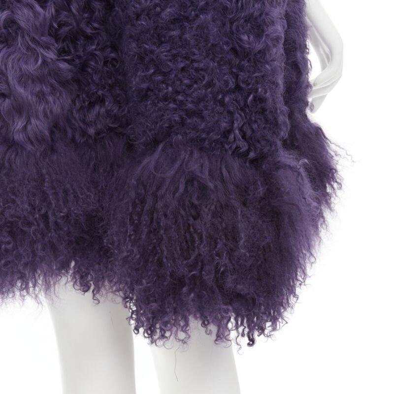 MIU MIU purple curly shearling fur contrast hem 3/4 sleeve coat IT36 XS
Reference: CELG/A00150
Brand: Miu Miu
Designer: Miuccia Prada
Material: Fur
Color: Purple
Pattern: Solid
Closure: Hook & Eye
Extra Details: Hook eye closure. Long fur trimming
