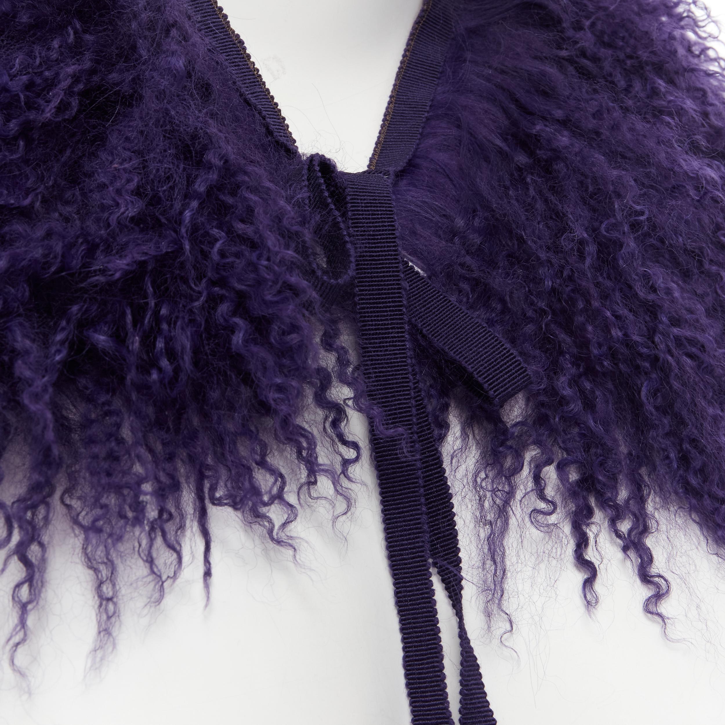 MIU MIU purple dye shaggy curly sheep shearling fur tie neck collar 
Reference: CELG/A00202 
Brand: Miu Miu 
Designer: Miuccia Prada 
Material: Fur 
Color: Purple 
Pattern: Solid 
Closure: Tie 
Made in: Italy 

CONDITION: 
Condition: Excellent, this