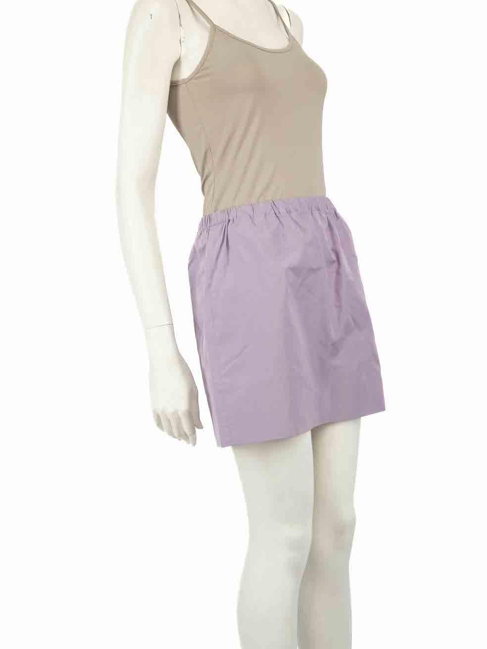 CONDITION is Good. General wear to skirt is evident. Moderate signs of discolouration to front and back of this used Miu Miu designer resale item.
 
 
 
 Details
 
 
 Purple
 
 Polyester
 
 Skirt
 
 Mini
 
 Elasticated waist
 
 
 
 
 
 Made in