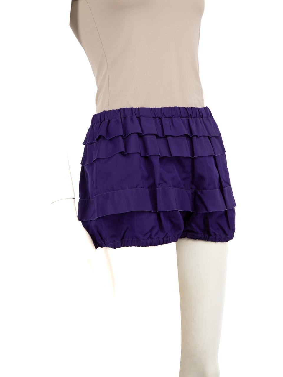 CONDITION is Very good. Minimal wear to the shorts is evident, the colour on the edge of the frill detail is slightly faded on this used Miu Miu designer resale item.
 
 Details
 
 
 Purple
 
 Polyester
 
 Shorts
 
 Layered
 
 Stretchy
 
