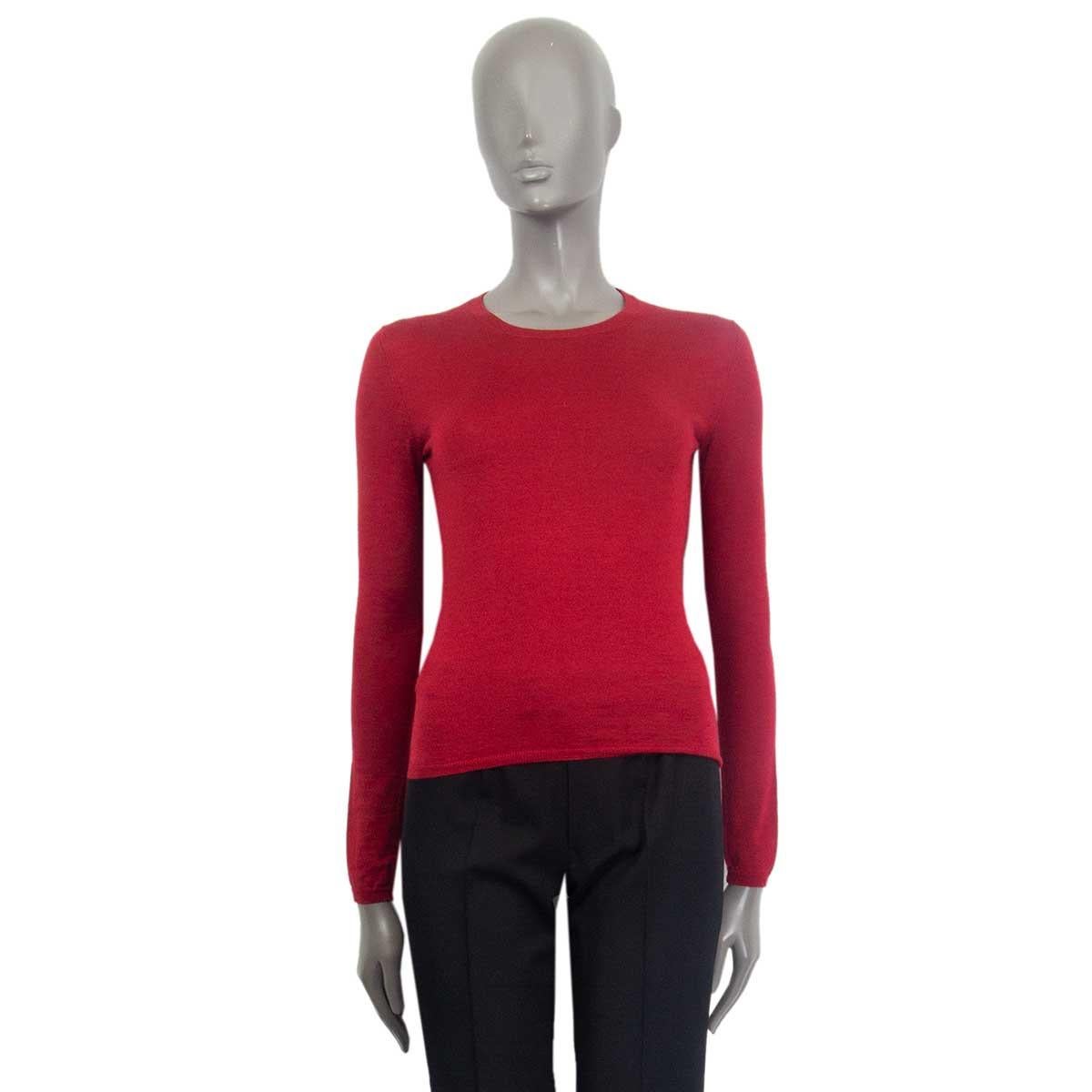 100% authentic Miu Miu crew neck sweater in red cashmere and silk blend (Missing content tag) with long sleeves. Has been worn and is in excellent condition.

Tag Size 40
Size S
Shoulder Width 37cm (14.4in)
Bust 78cm (30.4in)
Waist 70cm