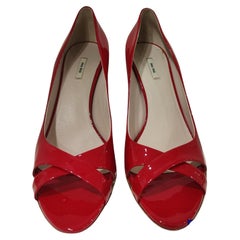 Retro Miu Miu red patent leather decollete