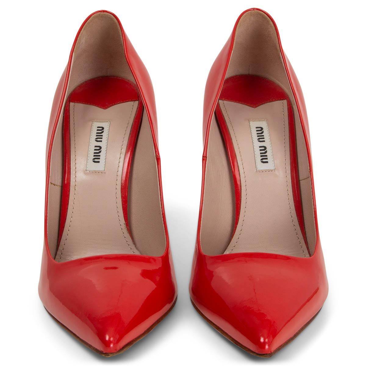 100% authentic Miu Miu pointed-toe pumps in red patent leather with embellished silver-tone glitter sole. Have been worn and are in excellent condition. 

Measurements
Imprinted Size	39
Shoe Size	39
Inside Sole	26cm (10.1in)
Width	7.5cm