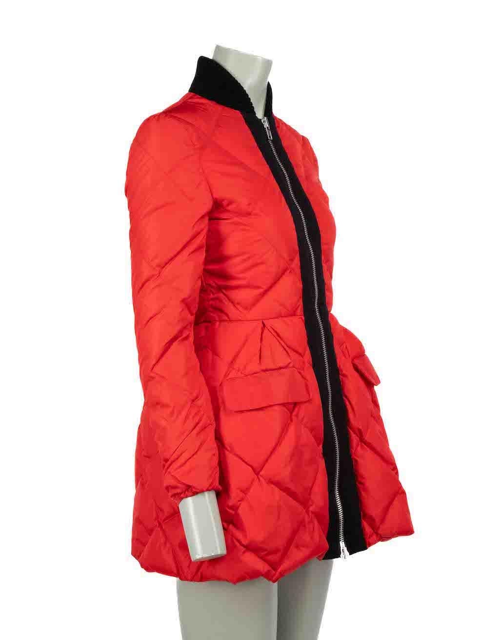 CONDITION is Good. Minor wear to jacket is evident. Light wear to fabric surface with small discoloured marks found at the shoulder. Waist tie is also missing on this used Miu Miu designer resale item.
 
 Details
 Red
 Synthetic
 Puffer jacket
 Mid