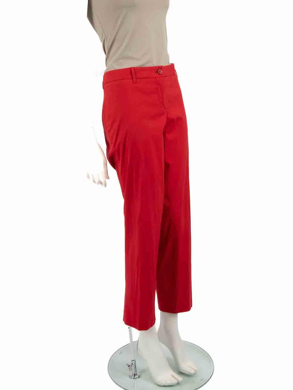 CONDITION is Very good. Minimal wear to trousers is evident. Minimal wear to the left leg with a small hole at the side seam and there is a mark to the front on this used Miu Miu designer resale item.
 
 Details
 Red
 Cotton
 Trousers
 Slim fit
 Mid