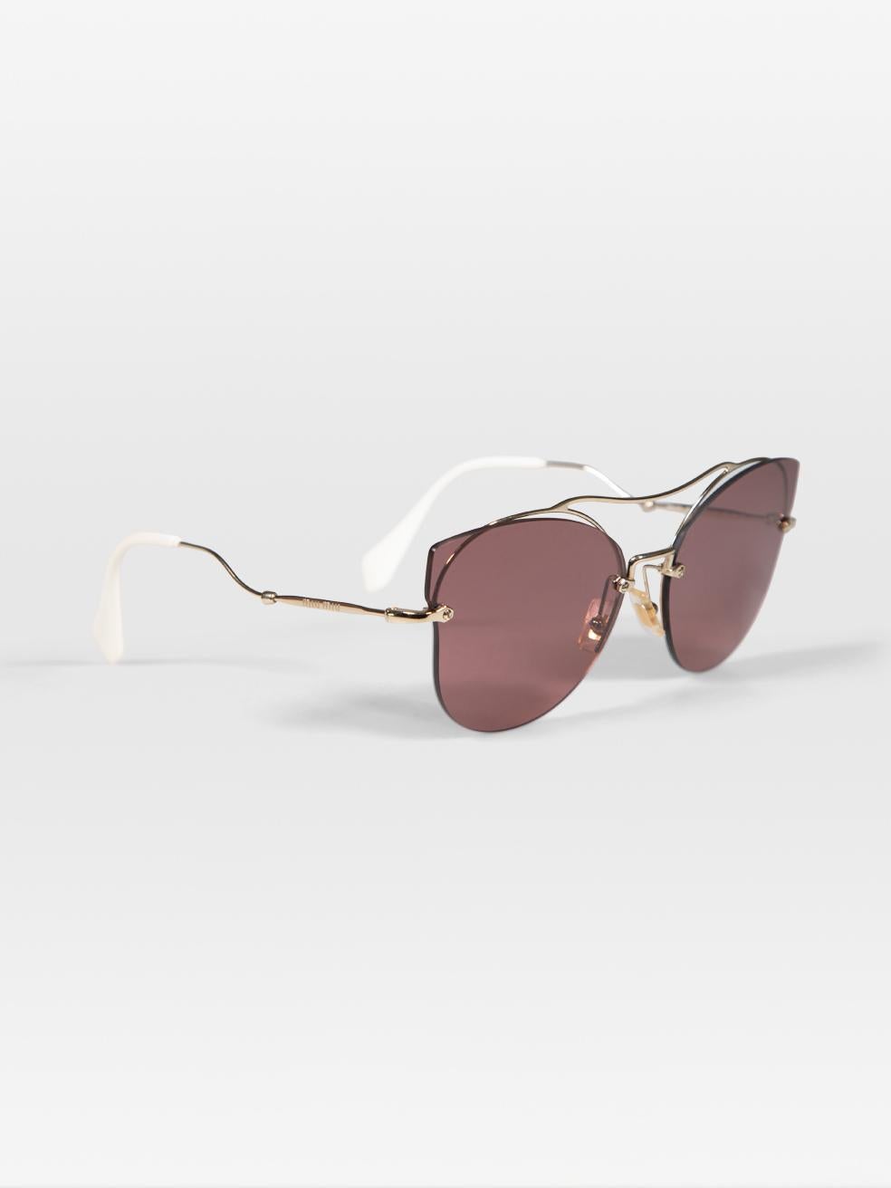 CONDITION is Very Good. Hardly any visible wear to the sunglasses is evident on this used Miu Miu designer resale item. This pair of sunglasses comes with the original dust bag and box.
 
 Details
 
 
 Rose
 
 Acetate
 
 Sunglasses
 
 Cat eye frame
