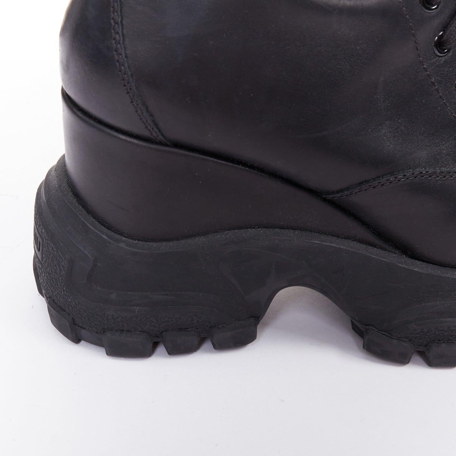 MIU MIU Runway botas altas de piel negra con logo y cordones y cuña EU39 1