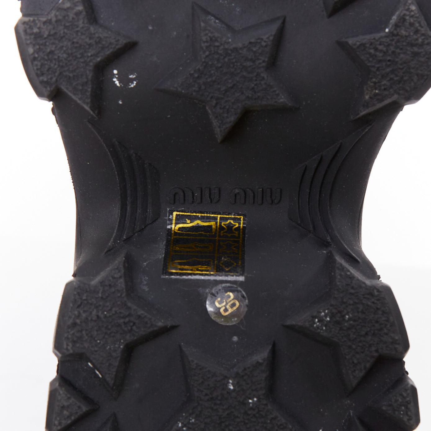 MIU MIU Runway botas altas de piel negra con logo y cordones y cuña EU39 4
