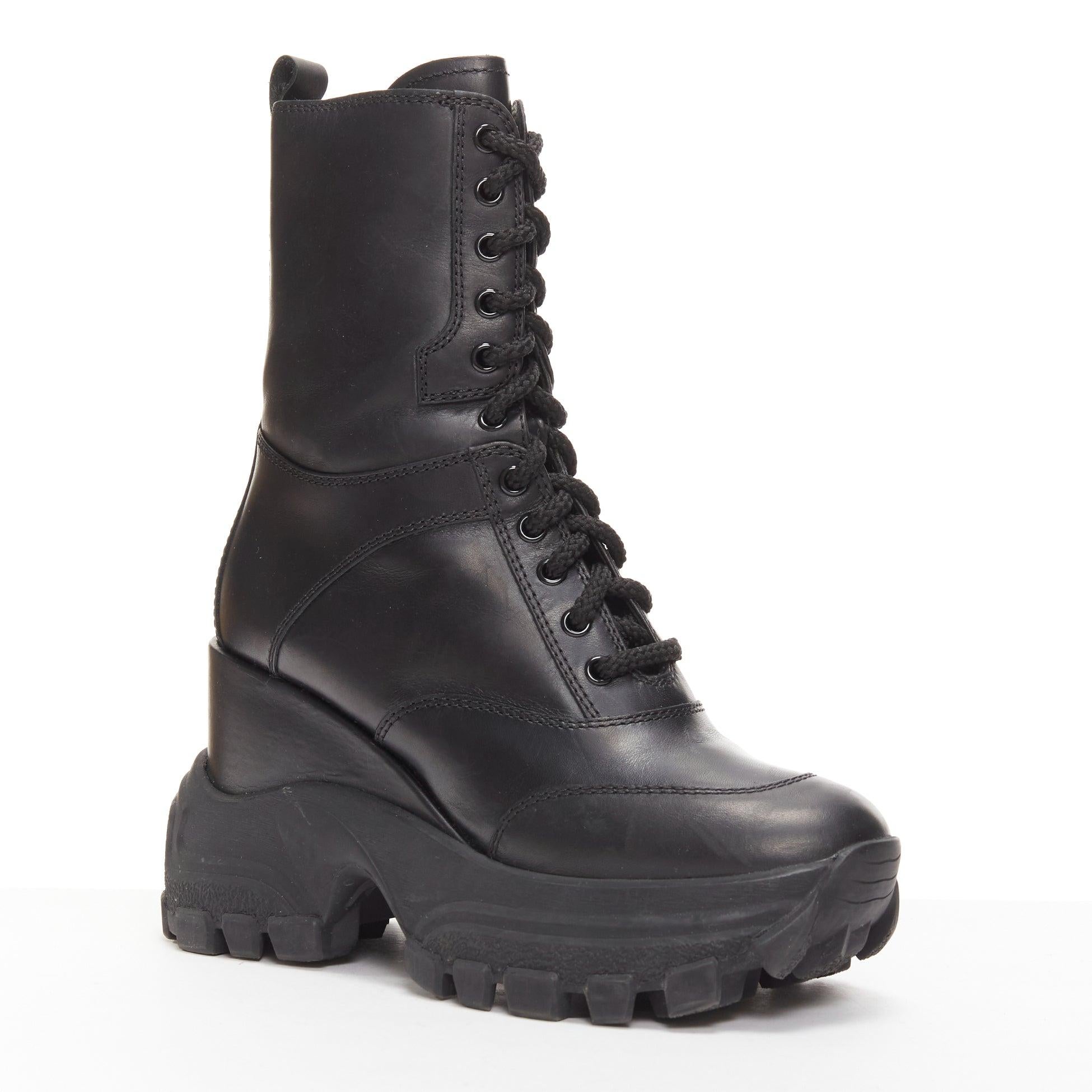 MIU MIU Runway black leather logo lace up chunky wedged military boots EU39
Reference: AAWC/A00953
Brand: Miu Miu
Designer: Miuccia Prada
Collection: Runway
Material: Leather
Color: Black, Silver
Pattern: Solid
Closure: Zip
Lining: Black
