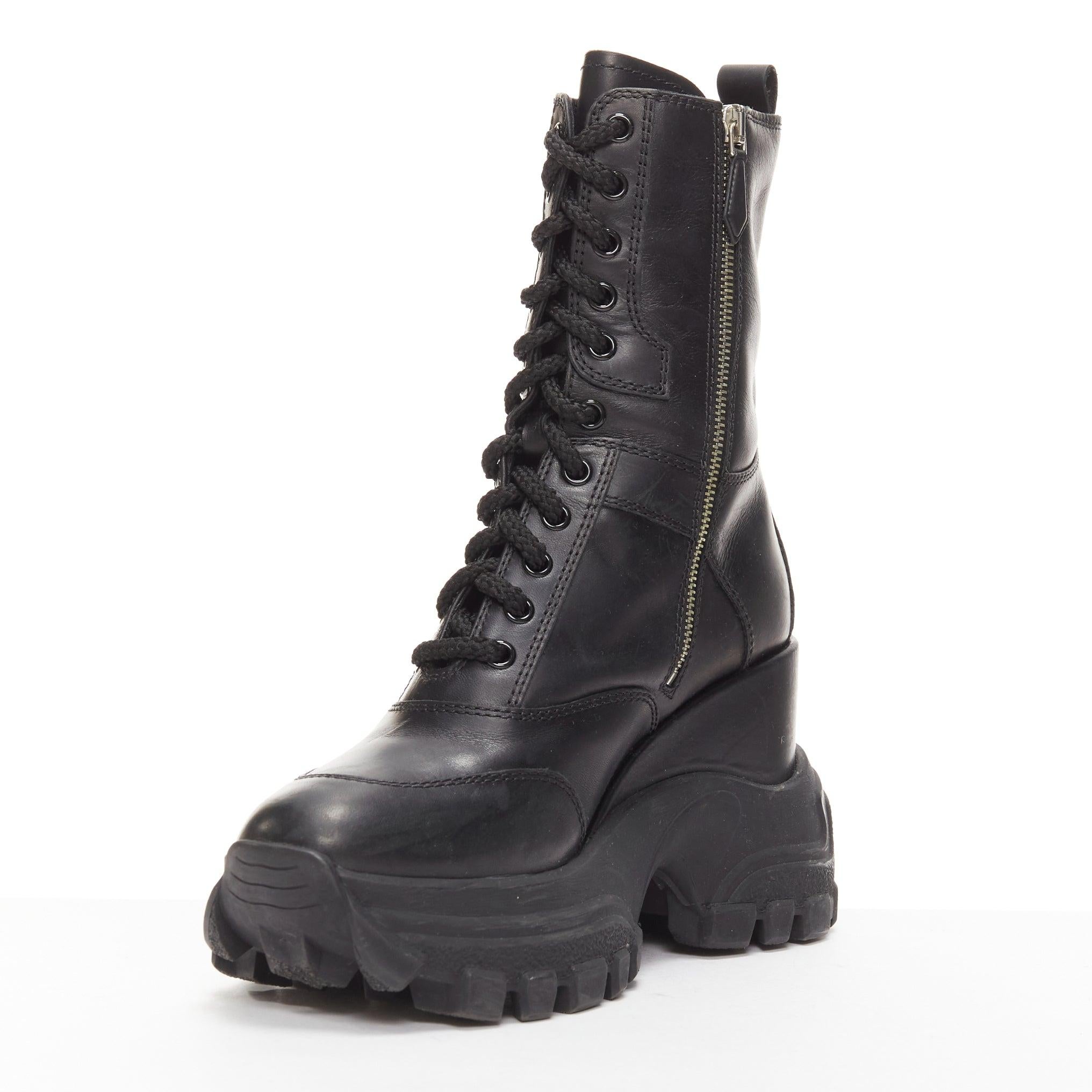 Women's MIU MIU Runway black leather logo lace up chunky wedged military boots EU39 For Sale