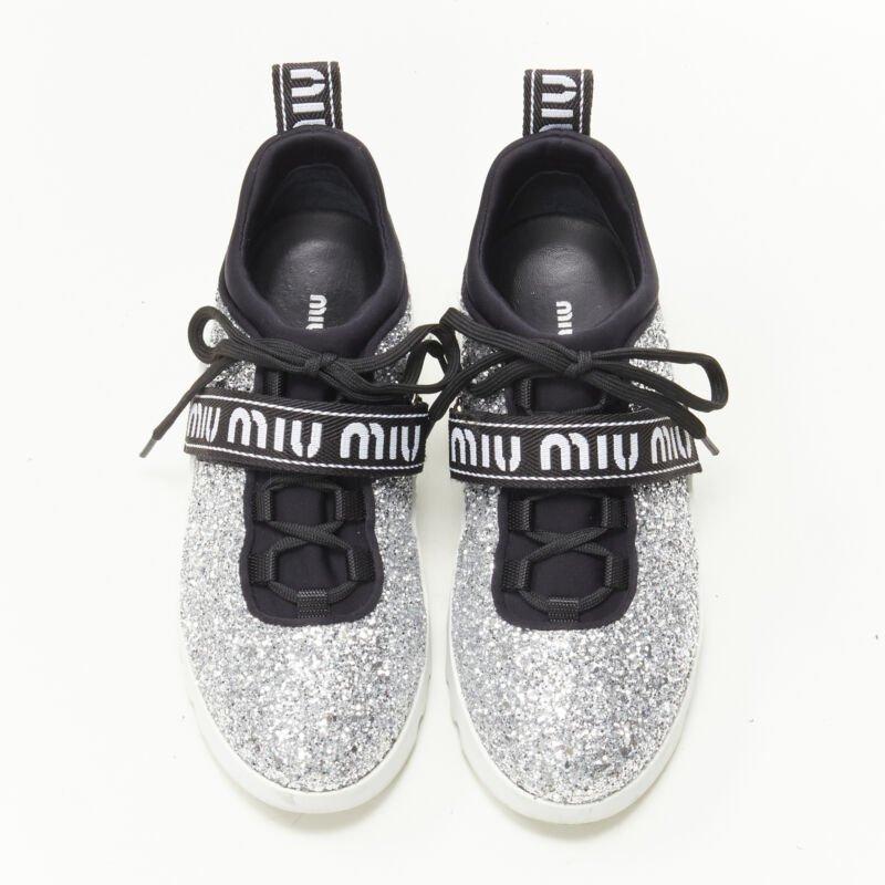 Silver MIU MIU silver glitter logo strap low top runner sneaker EU36