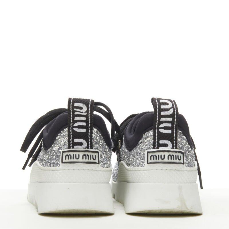 Women's MIU MIU silver glitter logo strap low top runner sneaker EU36