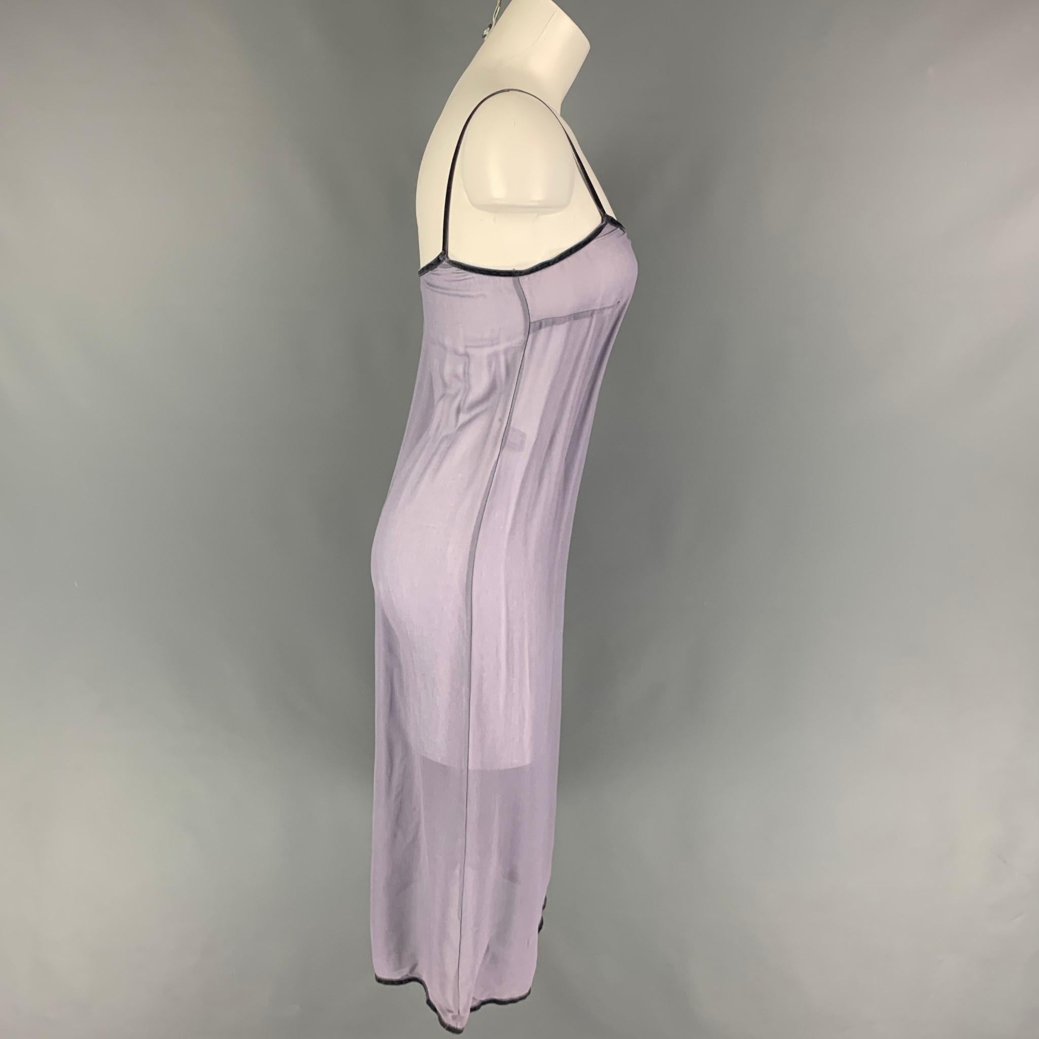MIU MIU dress comes in a lilac rayon featuring a slip style, spaghetti straps, and a velvet trim. Made in Italy. 

Very Good Pre-Owned Condition.
Marked: S

Measurements:

Bust: 28 in.
Hip: 36 in.
Length: 33.5 in.