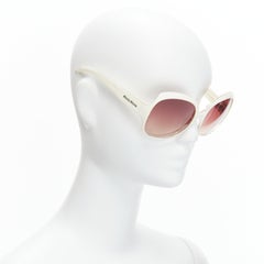 MIU MIU SMU021 cream white silver logo butterfly oversized sunglasses