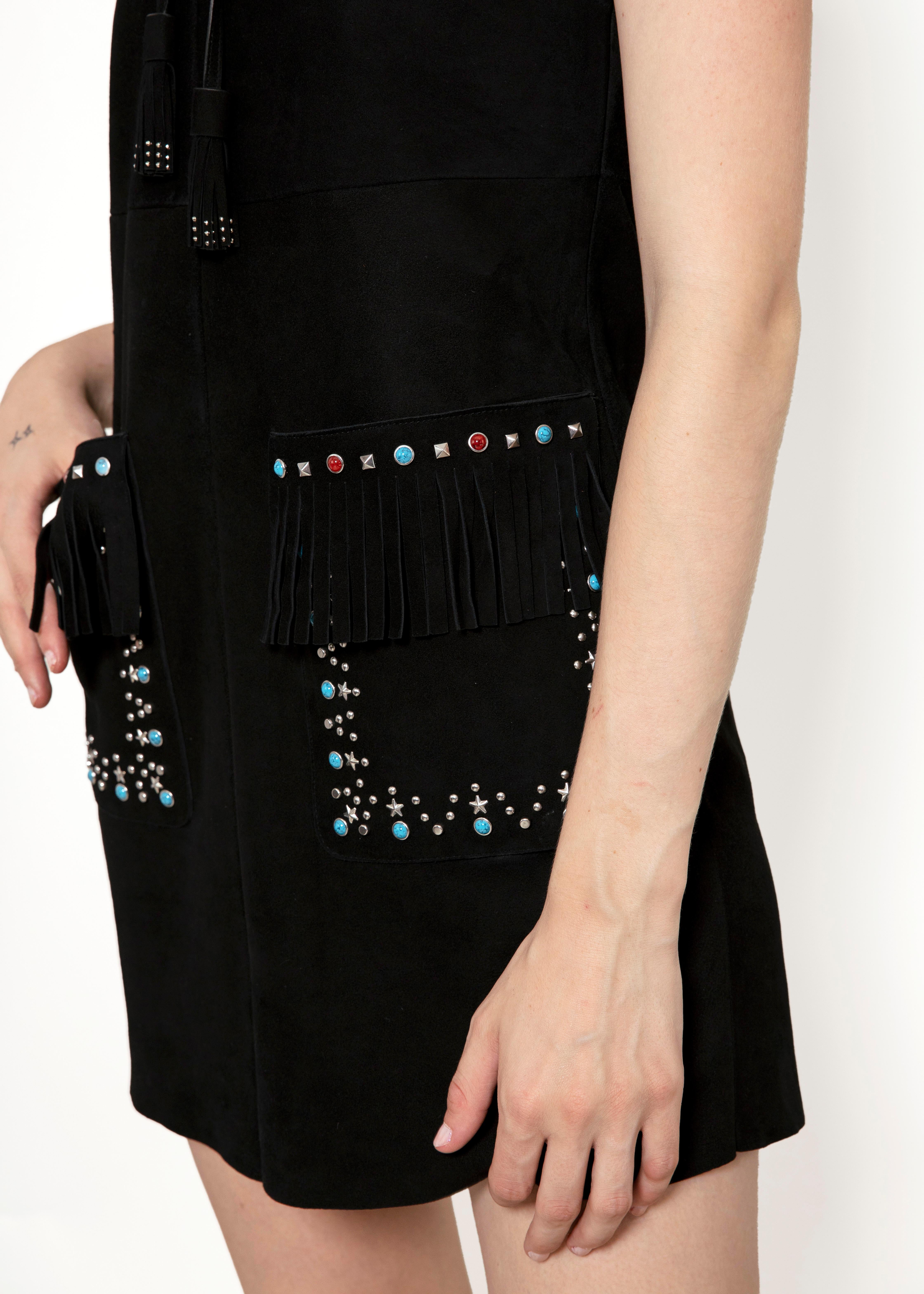 Be bold and daring in the Miu Miu Suede Beaded Dress. Featuring a lace-up design, this dress is adorned with turquoise and red star studs and jewels with fringe detail. Make a statement and stand out in this unique and eye-catching dress.
Condition: