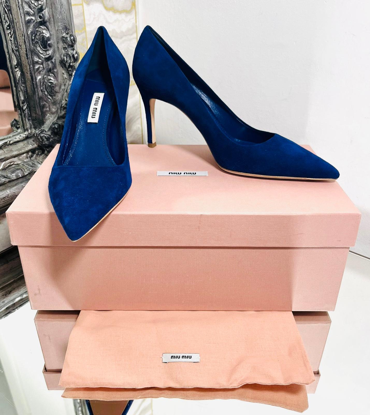 Miu Miu Suede Pumps

Cobalt blue heels designed with a pointed toe and stiletto heel.

Featuring leather lining, insoles and soles.

Size – 37

Condition – Excellent/Brand New

Composition – Suede

Comes with – Box, Dust Bag
