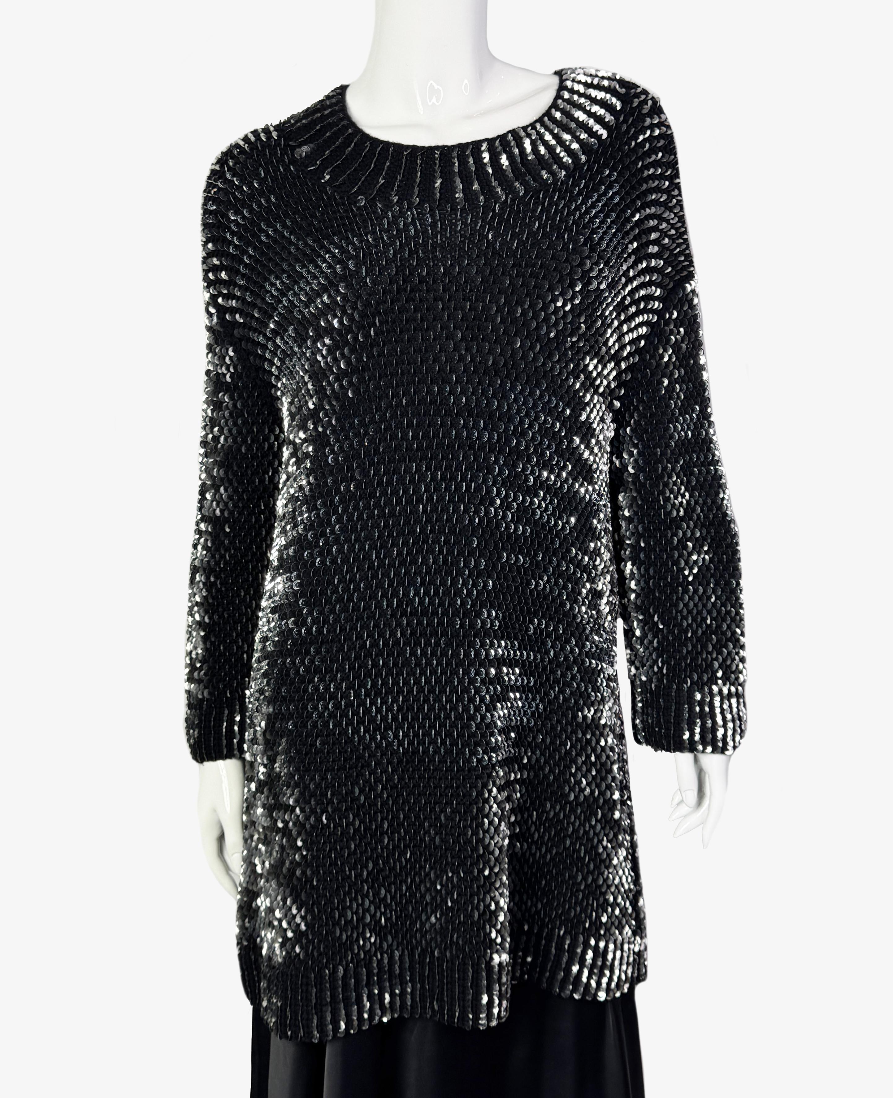 Miu Miu knitted long sweater with sequins

Size – S
Length – 73 cm
Sleeve – 45 cm
Shoulders – 52 cm
Chest – 94 cm
Waist – 96 cm

Fabric – 100% wool

Condition – very good

........Additional information ........

- Photo might be slightly different