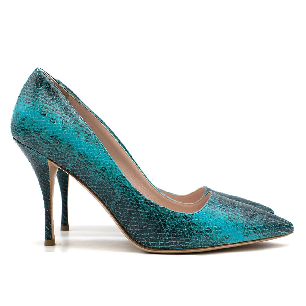 Miu Miu Teal Python-effect leather pumps

- Turquoise python-effect leather
- Pointed toe
- Slip on

Please note, these items are pre-owned and may show some signs of storage, even when unworn and unused. This is reflected within the significantly