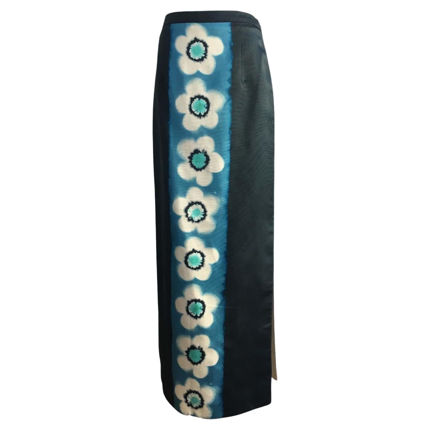 Miu Miu Kimono style navy long skirt with light blue, white, black tie dye flowers on center front. 
Unworn. Size : 38 IT
Measurements :
Waist : 70 cm
Length : 96 cm
Side slit : 49 cm
