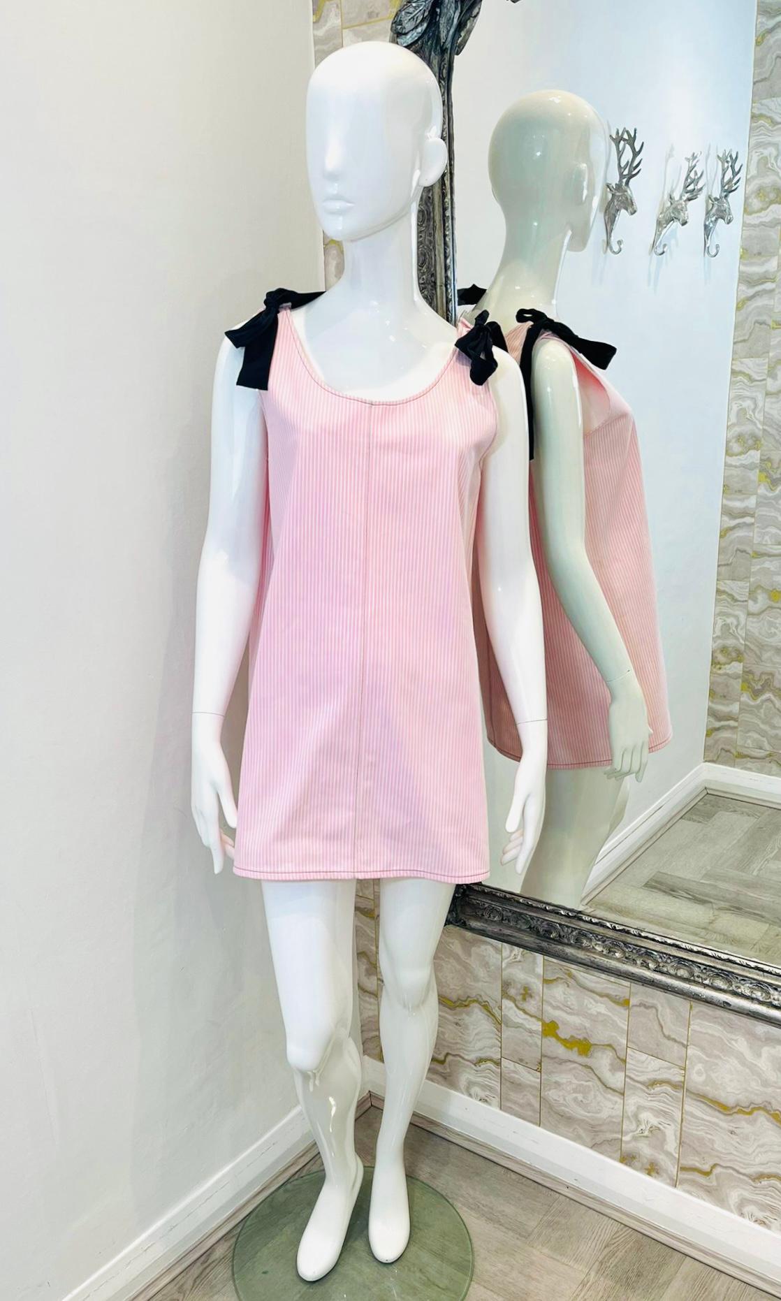 Brand New - Miu Miu Tie-Shoulder Cotton Dress

Baby pink, stripe patterned mini dress.

Designed with black, self-tie detail to the shoulders.

Featuring round neckline and shift silhouette.

Size – 44IT

Condition – Brand New, With
