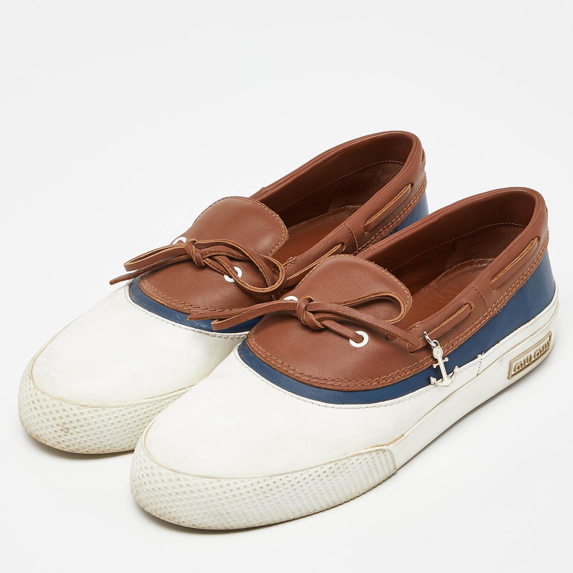 Give your outfit a luxe update with this pair of Miu Miu sneakers. The shoes are sewn perfectly to help you make a statement in them for a long time.