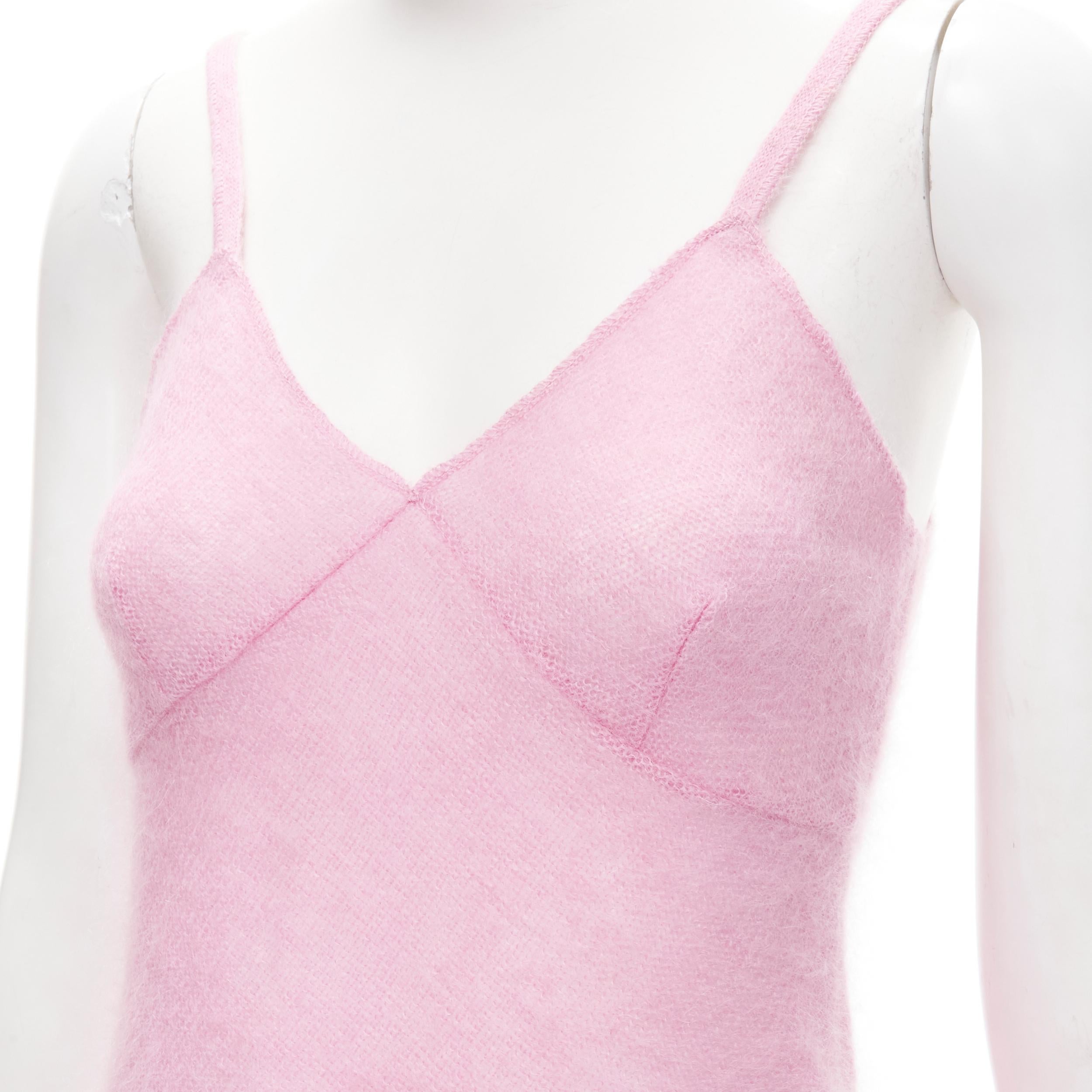 MIU MIU Vintage Y2K pink fine wool knit minimal camisole IT38 XS 
Reference: ANWU/A00723 
Brand: Miu Miu 
Material: Feels like cool 
Color: Pink 
Pattern: Solid 
Extra Detail: Fine knit wool. Bust dart. 
Made in: Italy 

CONDITION: 
Condition:
