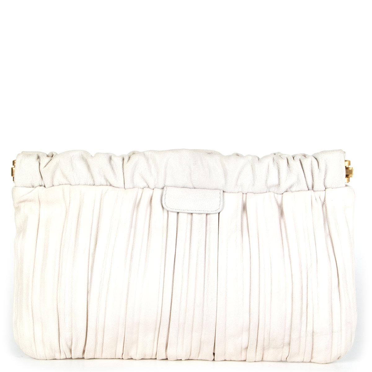 white leather clutch bag